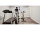 This home features an exercise room with a treadmill, elliptical, and stationary bike at 3141 Branford Ct, Marietta, GA 30062