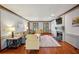 Inviting living room featuring hardwood floors, a fireplace, and neutral decor at 3141 Branford Ct, Marietta, GA 30062