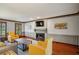 Inviting living area with a fireplace, hardwood floors, and a view of the backyard at 3141 Branford Ct, Marietta, GA 30062