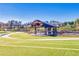Scenic view of a modern outdoor amphitheater on lush green lawns, perfect for community events at 3315 Hillshire Dr, Cumming, GA 30028
