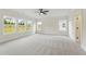 Spacious bedroom boasting natural light and three windows showcasing outdoor views at 3315 Hillshire Dr, Cumming, GA 30028
