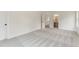 View of a bedroom leading into a hallway with stylish neutral carpeting and a modern design at 3315 Hillshire Dr, Cumming, GA 30028