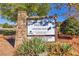 Scenic visitor center entrance with stone accents, sign and lush landscaping at 3315 Hillshire Dr, Cumming, GA 30028