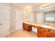 Spacious bathroom with a long countertop with double sinks at 3320 Gardenside Dr, Loganville, GA 30052