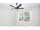 Cozy bedroom with plush carpet, neutral paint, and a ceiling fan for added comfort at 3320 Gardenside Dr, Loganville, GA 30052