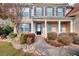 Inviting front entrance with brick facade, manicured landscaping, and walkway leading to the front door at 3320 Gardenside Dr, Loganville, GA 30052