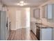 Beautiful kitchen featuring modern appliances, ample counter space, and updated cabinets at 3320 Gardenside Dr, Loganville, GA 30052