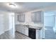 Kitchen featuring granite countertops, stainless steel appliances, and updated cabinets at 3320 Gardenside Dr, Loganville, GA 30052