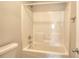 Bright white shower and tub combination with clean lines at 3320 Gardenside Dr, Loganville, GA 30052