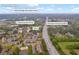 Aerial view highlighting the proximity of a home to Abbots Bridge Recreation Area and Peachtree Industrial Blvd at 113 Brittany Ct, Duluth, GA 30096