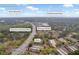 A panoramic aerial view shows a home near Stone Mountain, the Chattahoochee River, and Peachtree Industrial Blvd at 113 Brittany Ct, Duluth, GA 30096
