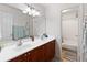 Bathroom with a double sink vanity and a view of the shower at 113 Brittany Ct, Duluth, GA 30096
