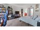 View of bedroom with bookshelves and a large bed at 113 Brittany Ct, Duluth, GA 30096