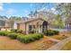 View of the clubhouse and surrounding landscaping at 113 Brittany Ct, Duluth, GA 30096