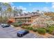 Exterior view of property with a parking lot in front of it at 113 Brittany Ct, Duluth, GA 30096