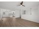 Spacious living area with wood-style flooring, offering a blank canvas for customization at 209 Emma Gilley Dr, Carrollton, GA 30116