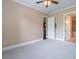 Bright bedroom with large window, ceiling fan and ensuite bathroom access at 3635 E Paces Ne Cir # 1209, Atlanta, GA 30326