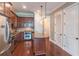 Modern kitchen equipped with stainless steel appliances, granite counters, and wood cabinets, designed for efficiency at 3635 E Paces Ne Cir # 1209, Atlanta, GA 30326