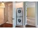 Convenient laundry area with stacked washer and dryer units at 3635 E Paces Ne Cir # 1209, Atlanta, GA 30326