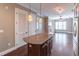 Well-lit living space seamlessly connected to the kitchen area, showcasing modern design elements at 3635 E Paces Ne Cir # 1209, Atlanta, GA 30326