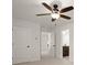View of a bedroom leading into the bathroom, with dual closets on the right at 5925 Pine Bluff Dr, Cumming, GA 30040
