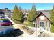 Attractive wooden building with landscaped surroundings, located near parking and retail establishments at 5925 Pine Bluff Dr, Cumming, GA 30040
