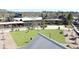 Upscale commercial area showing outdoor seating, green space, and a variety of dining establishments at 5925 Pine Bluff Dr, Cumming, GA 30040