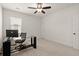 Bright office space with a modern desk and large window at 5925 Pine Bluff Dr, Cumming, GA 30040