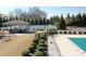 Neighborhood Tennis Courts, Pool and Covered Patio with tables and chairs at 5925 Pine Bluff Dr, Cumming, GA 30040