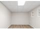 Spacious finished basement with two windows providing natural light at 2611 Rock Point Ln, Snellville, GA 30039
