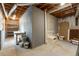 Unfinished basement space with concrete walls and exposed ceiling, ready for customization at 2611 Rock Point Ln, Snellville, GA 30039