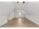 A large bonus room features wood-look flooring and natural light at 2611 Rock Point Ln, Snellville, GA 30039