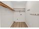 Walk-in closet with custom shelving and racks at 2611 Rock Point Ln, Snellville, GA 30039