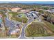 Aerial view of City Center, displaying its layout, green spaces, parking, and access roads at 3330 Hillshire Dr, Cumming, GA 30028