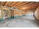 Spacious unfinished basement with exposed beams and insulation providing a blank canvas for customization at 3330 Hillshire Dr, Cumming, GA 30028