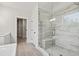 Elegant bathroom with frameless glass shower and neutral tile at 3330 Hillshire Dr, Cumming, GA 30028