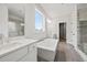 Modern bathroom featuring a soaking tub and spacious walk-in shower at 3330 Hillshire Dr, Cumming, GA 30028