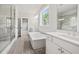 Beautiful bathroom with walk in shower, free standing tub and double vanity at 3330 Hillshire Dr, Cumming, GA 30028