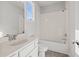 Bathroom features a tub, shower, and a white countertop sink at 3330 Hillshire Dr, Cumming, GA 30028