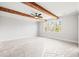 Spacious bedroom features exposed beam ceiling, ceiling fan, and large window at 3330 Hillshire Dr, Cumming, GA 30028