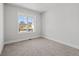 Empty bedroom with carpeting and a bright window at 3330 Hillshire Dr, Cumming, GA 30028