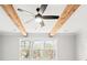 Close up of bedroom ceiling features exposed beams and a black ceiling fan at 3330 Hillshire Dr, Cumming, GA 30028