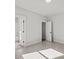 This bedroom features neutral walls, plush carpeting, and an ensuite bathroom at 3330 Hillshire Dr, Cumming, GA 30028
