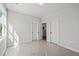 Bedroom with a large window and natural light with two doors visible at 3330 Hillshire Dr, Cumming, GA 30028