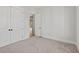 An inviting bedroom featuring plush carpeting and neutral walls, creating a calming atmosphere at 3330 Hillshire Dr, Cumming, GA 30028
