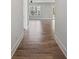 Hallway with hardwood flooring and neutral wall paint at 3330 Hillshire Dr, Cumming, GA 30028