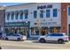 Picturesque storefronts with awnings and decorative details, set along a bustling street at 3330 Hillshire Dr, Cumming, GA 30028