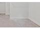 Spacious walk-in closet in neutral tones features ample storage for an organized wardrobe at 3330 Hillshire Dr, Cumming, GA 30028