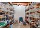 Unfinished basement with ample storage shelving at 4840 Brent Knoll Ln, Suwanee, GA 30024