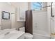 Bathroom with a shower/tub combination, tiled floor, and white vanity at 4840 Brent Knoll Ln, Suwanee, GA 30024